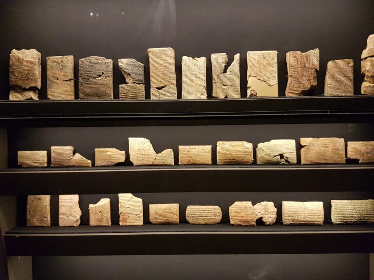 An ancient library displaying historic texts and architectural drafts representing the all seeing eye and structural wealth planning.