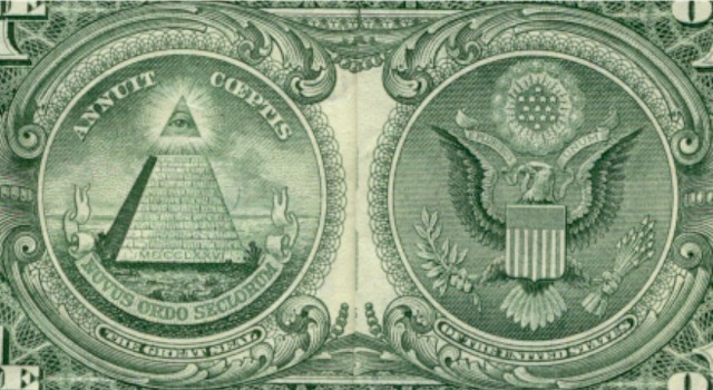 A classic representation of the annuit coeptis meaning on a golden seal highlighting elite historical organization.