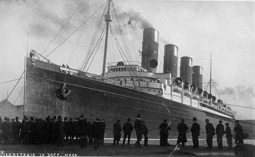 A historical passenger liner launching from a shipyard, illustrating the scale of construction related to the titanic 666 analysis.