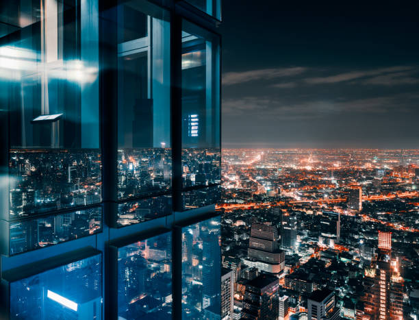 A successful entrepreneur looking over the city skyline, planning long-term asset expansion within secure secret societies
