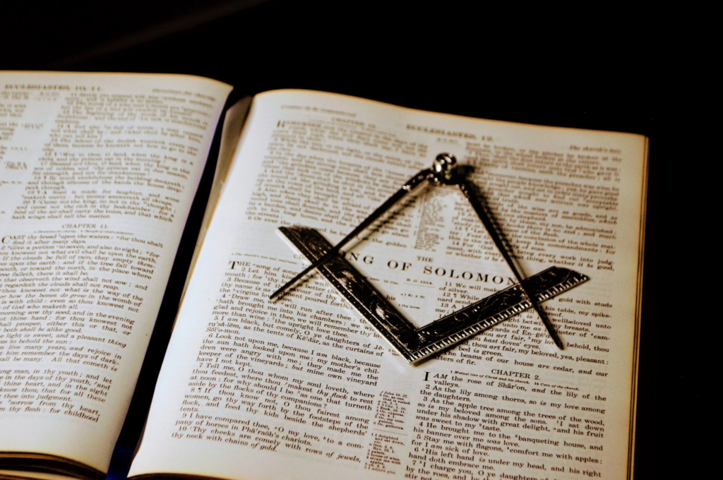 Classic masonic symbols representing geometry and disciplined planning used by historic secret societies.