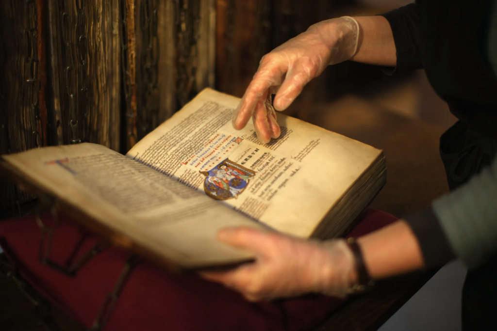 Visionary builders studying historical lineage files to understand how secret societies organize.