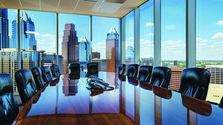 A professional office setting displaying tools used by the shadow government to coordinate global wealth assets