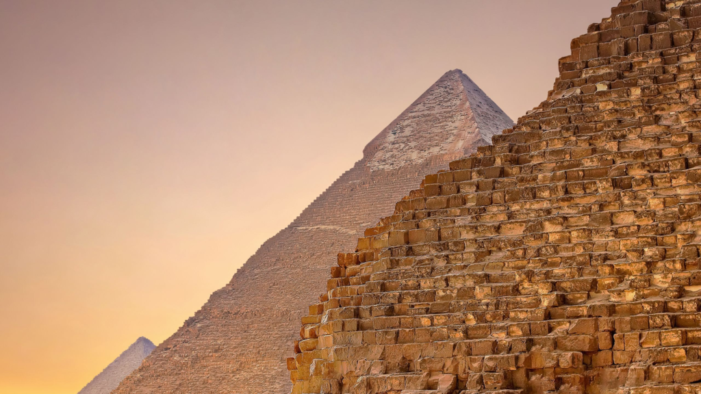 A stone monument displaying ancient geometry and masonic symbols representing visual alignment.