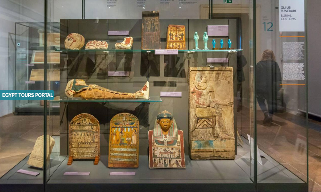 A display showcasing the pyramid collection of historic artifacts used by societies to maintain elite authority.
